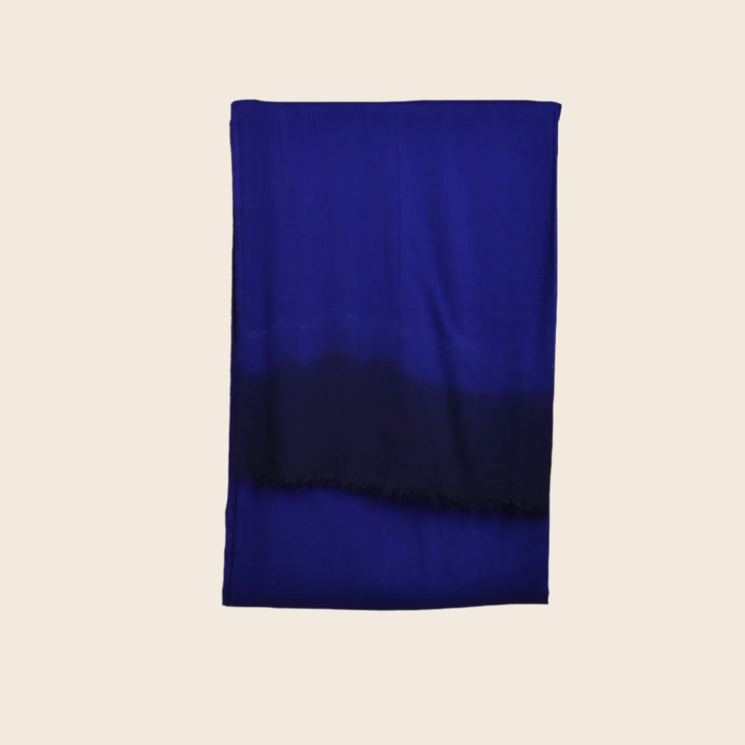 Indigo Blue Soaked Tagelmust scarf – rich royal‑blue fading to deep navy, sustainably sourced lightweight Moroccan headscarf ideal for nomadic travelers searching for indigo or navy blue scarves for hot weather and dry climates.