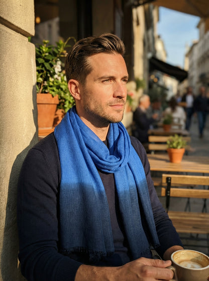 Man wearing indigo Moroccan Tagelmust as a breathable desert headscarf, lightweight safari scarf built for Sahara trekking and dust protection.