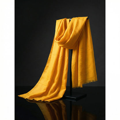 Lightweight Original Sunglow Orange Tagelmust crafted in sustainably sourced rayon fabric, breathable Moroccan desert headscarf designed for Sahara travel, safari protection, and hot climate exploration.