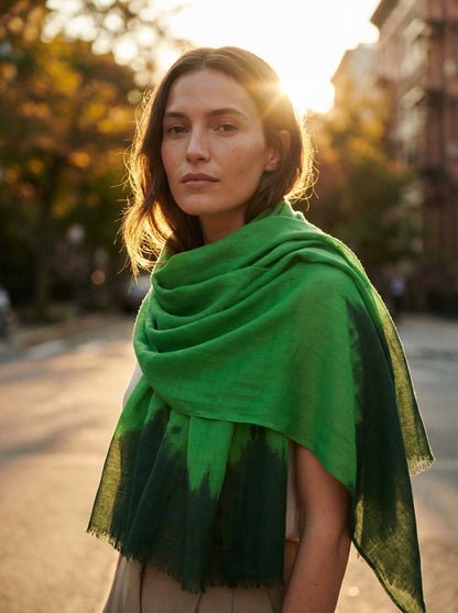 Green Tagelmust styled as a lightweight travel scarf for women, Touareg inspired Moroccan headscarf ideal for hot climate exploration.