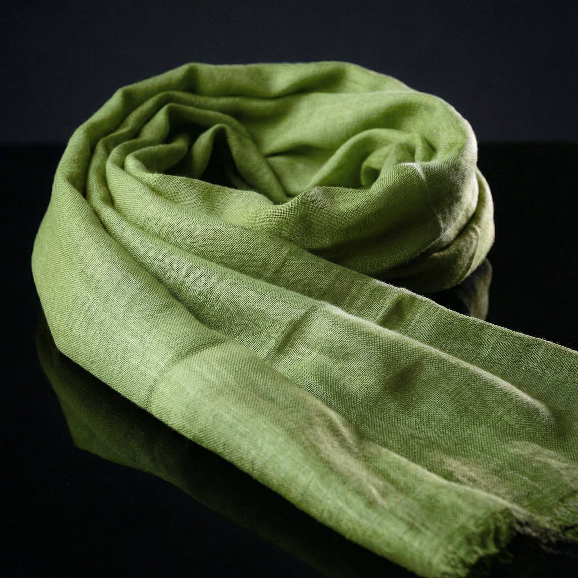 Lightweight tan green Tagelmust in rayon fabric, designed as a breathable desert headscarf for Sahara and Safari 
travel.