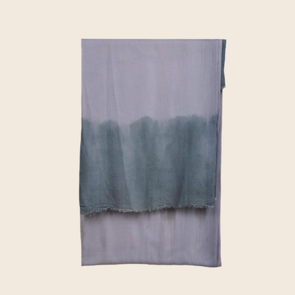 Cinerous Gray Soaked Tagelmust scarf – slate‑grey base with teal green gradient. Sustainably sourced, lightweight Moroccan headscarf ideal for nomadic travelers searching for grey or teal scarves for hot weather and dry climates