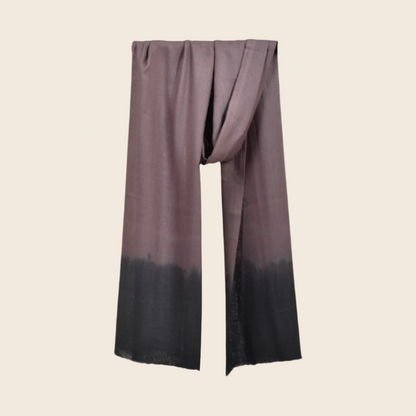 Taupe Gray Soaked Tagelmust scarf – elegant taupe‑brown hanging wrap fading to charcoal black gradient. Sustainably sourced lightweight Moroccan headscarf perfect for nomadic travelers searching for taupe, grey, or charcoal scarves for hot‑weather, dry‑climate adventures.